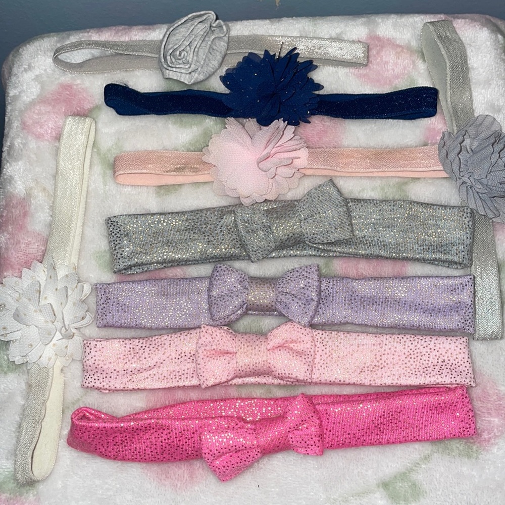 Lots of baby headbands different colors pink,gray,purple and white